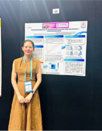 Scholarship recipient with poster